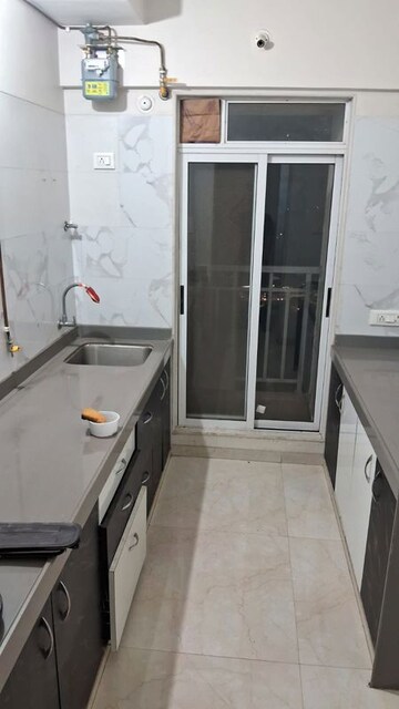 Kitchen in 1 BHK Apartment at Vihang Vermont, Ghodbunder Road – for Rent