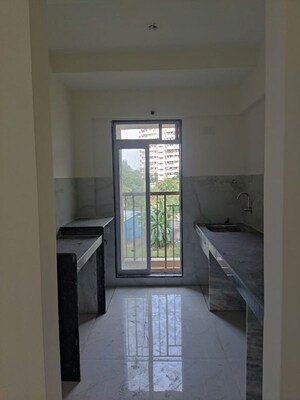 Living Room in 1 BHK Apartment at Metropolis Bayside, Kasarvadavali – for Rent