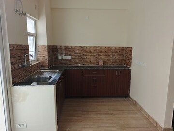 Kitchen in 2 BHK Apartment at Habitech Panch Tatva, Tech Zone 4 Greater Noida – for Sale