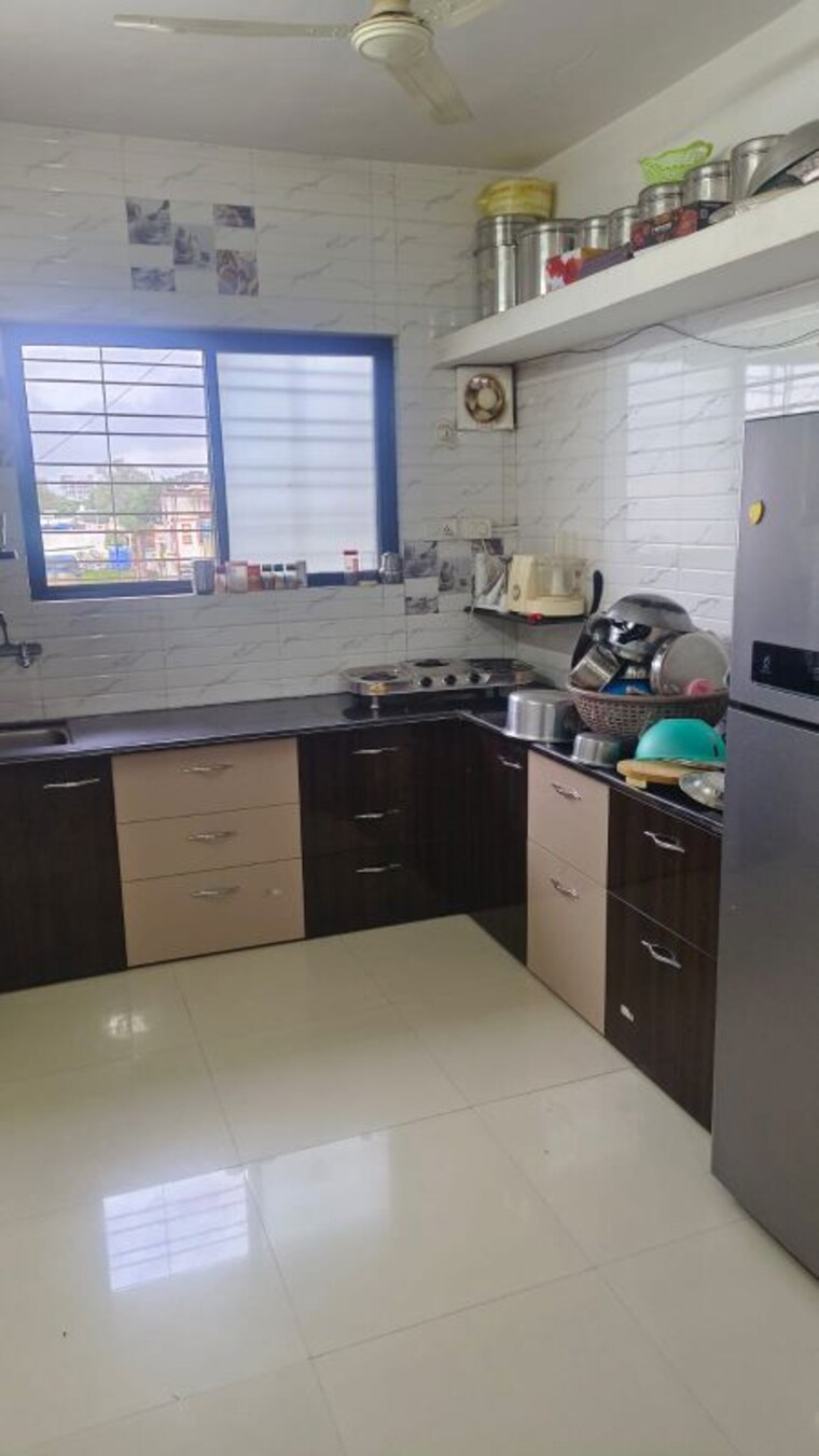 Kitchen, eden-rose-3 1 Bedroom 600 Sq.Ft. Apartment In Mira Road Thane 9820756