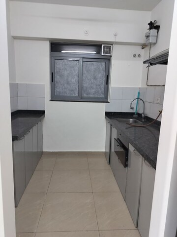 Kitchen in 1.5 BHK Apartment at Amanora Future Towers, Hadapsar – for Rent