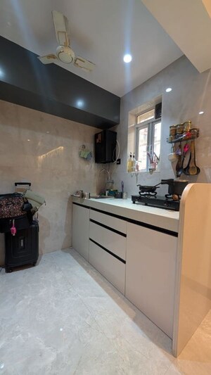 Kitchen in 1 RK Apartment at Royal Palms, Goregaon East – for Rent