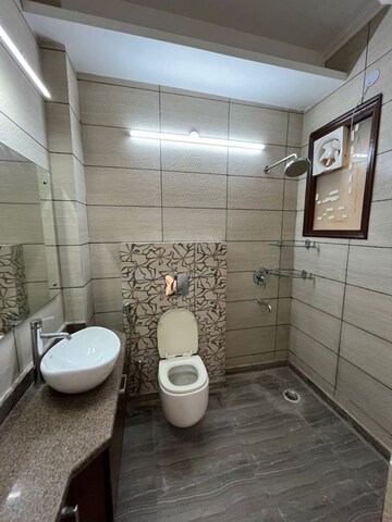 Bathroom in 3 BHK Builder Floor at Sushant Lok I – for Rent