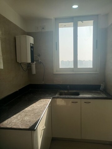 Kitchen in 3 BHK Apartment at Jaypee Kalypso Court, Sector 128 – for Rent