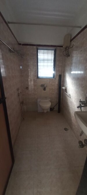 Bathroom in 2 BHK Apartment at Satellite Garden, Goregaon East – for Rent