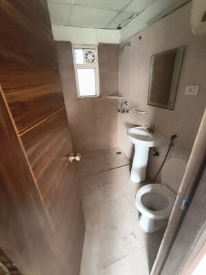 Bathroom in 3.5 BHK Apartment at Aims Golf City, Sector 75 – for Rent