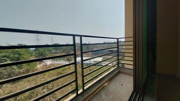 Balcony in 1 BHK Apartment at Vantage Green Woods, Shilphata – for Sale