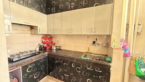 Kitchen in 2 BHK Apartment at Emenox Brave Hearts, Raj Nagar Extension – for Rent