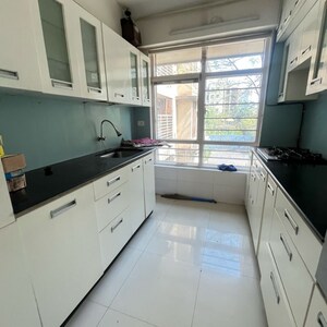 Kitchen in 3 BHK Apartment at Grandeur Tower, Maratha Colony – for Rent