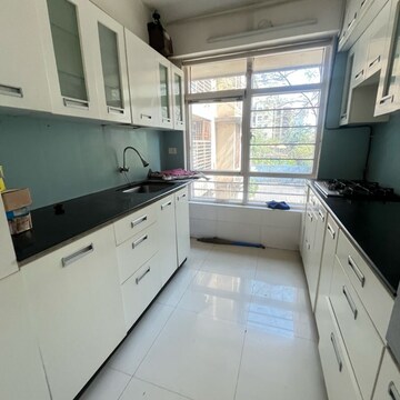 Kitchen in 3 BHK Apartment at Grandeur Tower, Maratha Colony – for Rent