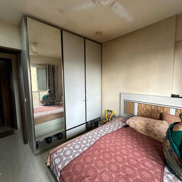 Bedroom in 2 BHK Apartment at Supreme 19, Lokhandwala Complex – for Sale