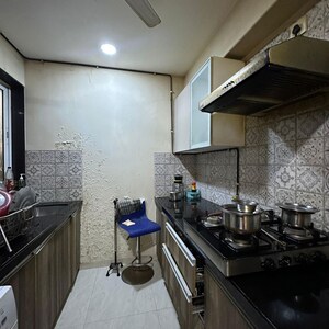 Kitchen in 2 BHK Apartment at Supreme 19, Lokhandwala Complex – for Sale