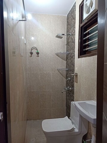 Bathroom in 2 BHK Builder Floor at Chattarpur – for Sale