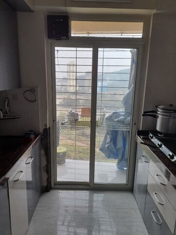 Kitchen in 2 BHK Apartment at Puraniks Tokyo Bay, Kasarvadavali – for Sale