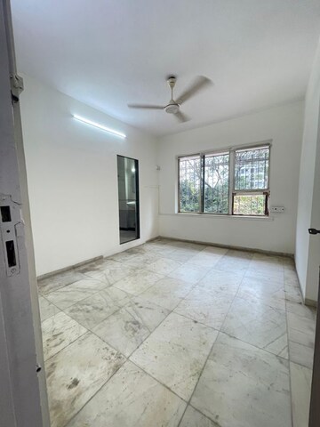 Room in 2 BHK Apartment at Grenville CHS, Andheri West – for Rent