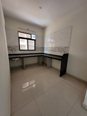 Kitchen in 2 BHK Apartment at Raj Tulsi City, Badlapur East – for Sale