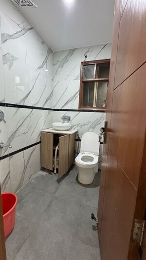 Bathroom in 3 BHK Apartment at Chattarpur – for Sale