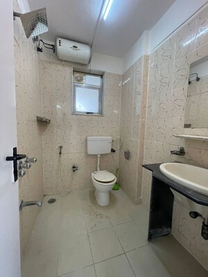 Bathroom in 2 BHK Apartment at Grenville CHS, Andheri West – for Rent