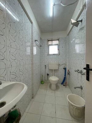 Bathroom in 2 BHK Apartment at Grenville CHS, Andheri West – for Rent