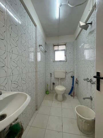 Bathroom in 2 BHK Apartment at Grenville CHS, Andheri West – for Rent