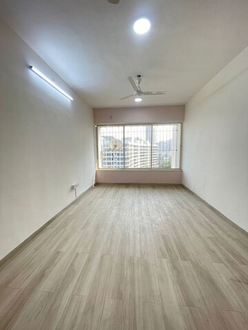 Room in 2 BHK Apartment at Grenville CHS, Andheri West – for Rent