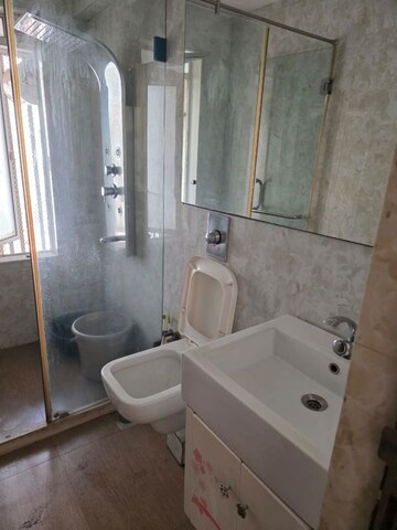 Bathroom in 3 BHK Apartment at Chamunda Heritage, Andheri East – for Rent
