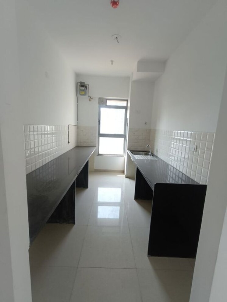 Kitchen, kalpataru-immensa 2 Bedroom 761 Sq.Ft. Apartment In Kolshet Road Thane 9824911