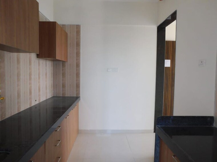 Kitchen, sheth-zuri 1.5 Bedroom 520 Sq.Ft. Apartment In Laxmi Nagar Thane 9824988