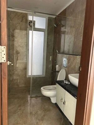 Bathroom in 3.5 BHK Apartment at Mahagun Mezzaria, Sector 78 – for Rent