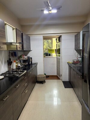 Kitchen in 3 BHK Apartment at Satnam Sharan Apartment, Chembur – for Rent