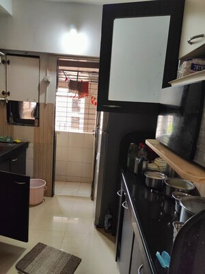 Kitchen in 2 BHK Apartment at Aristo Lloyds Estate, Wadala East – for Rent