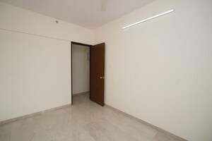 Room in 2 BHK Apartment at Abrol Signature, Malad West – for Sale