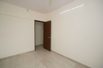 Room in 2 BHK Apartment at Abrol Signature, Malad West – for Sale