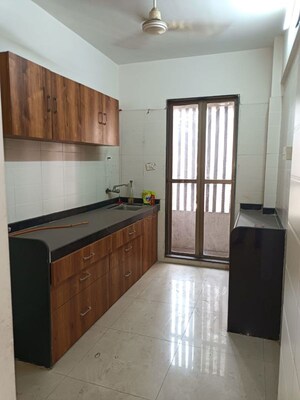 Kitchen in 2 BHK Apartment at Sadguru Complex II, Goregaon West – for Rent