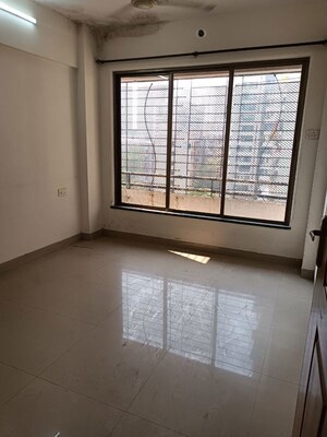 Room in 2 BHK Apartment at Sadguru Complex II, Goregaon West – for Rent