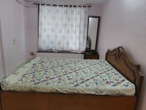 Bedroom in 2 BHK Apartment at Kshitij CHS, Goregaon East – for Rent