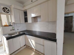 Kitchen in 3 BHK Apartment at JKG Palm Court, Sector 16c Greater Noida – for Rent
