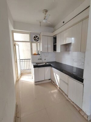 Kitchen in 3 BHK Apartment at JKG Palm Court, Sector 16c Greater Noida – for Rent