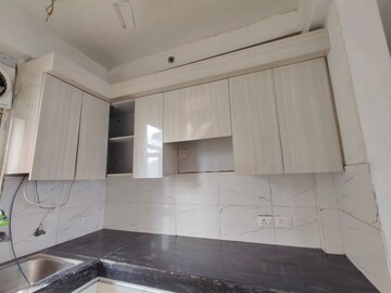 Kitchen in 3 BHK Apartment at JKG Palm Court, Sector 16c Greater Noida – for Rent