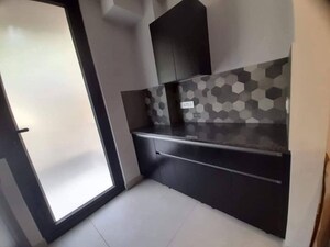 Kitchen in 2 BHK Apartment at Mahagun Mywoods, Sector 16c Greater Noida – for Rent