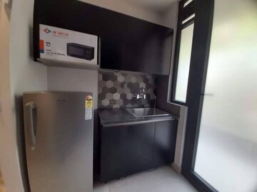 Kitchen in 2 BHK Apartment at Mahagun Mywoods, Sector 16c Greater Noida – for Rent