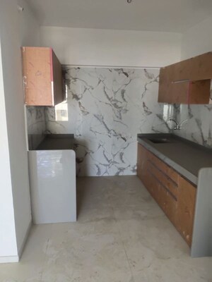 Kitchen in 3 BHK Apartment at Giriraj CHS Naupda, Naupada – for Sale