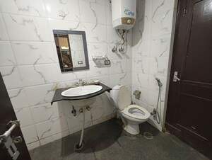 Bathroom in 3 BHK Apartment at CGHS HEWO Apartments, Sector 56 – for Rent