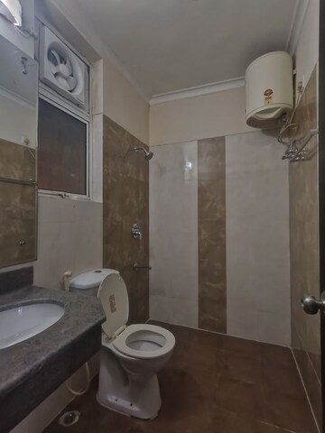 Bathroom in 3 BHK Apartment at Ansal API Esencia, Sector 67 – for Rent