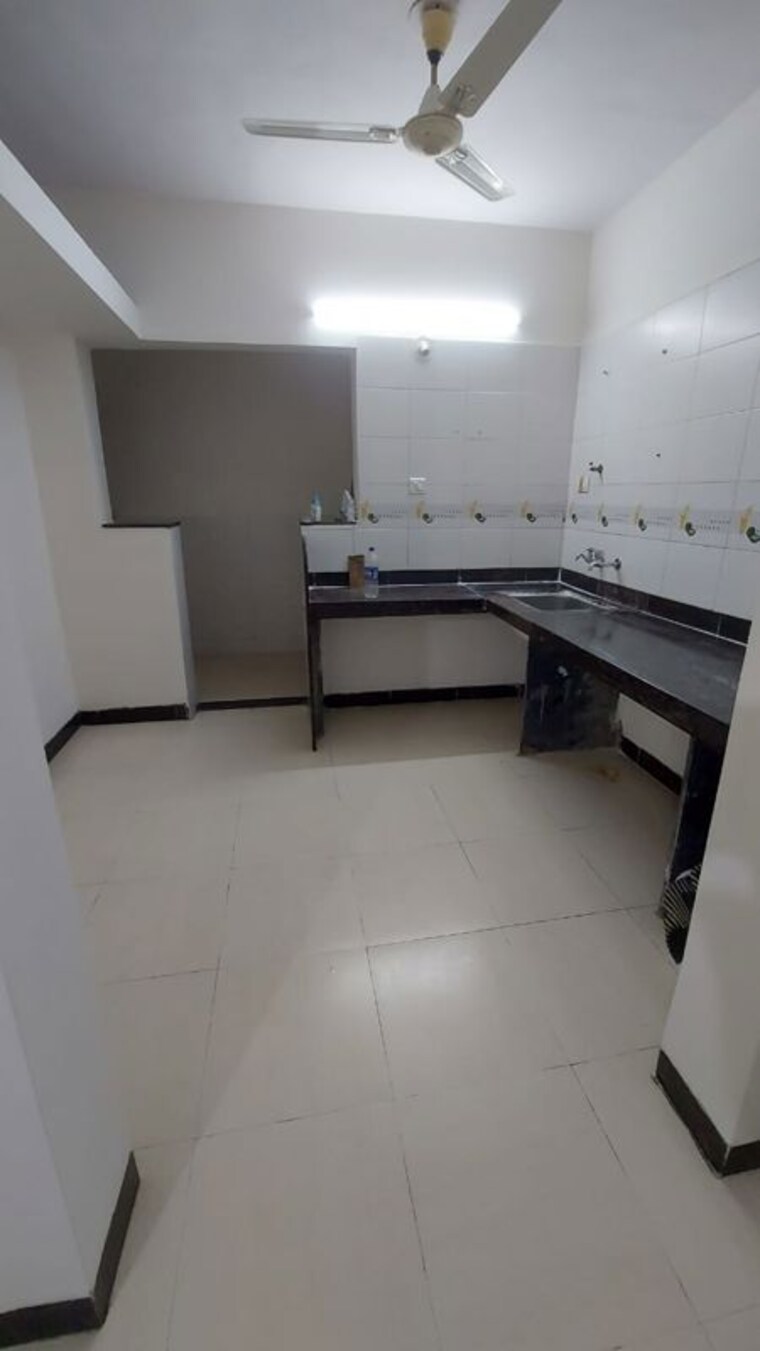 Kitchen, galaxy-flower-valley 1 Bedroom 560 Sq.Ft. Apartment In Kharadi Pune 9825750