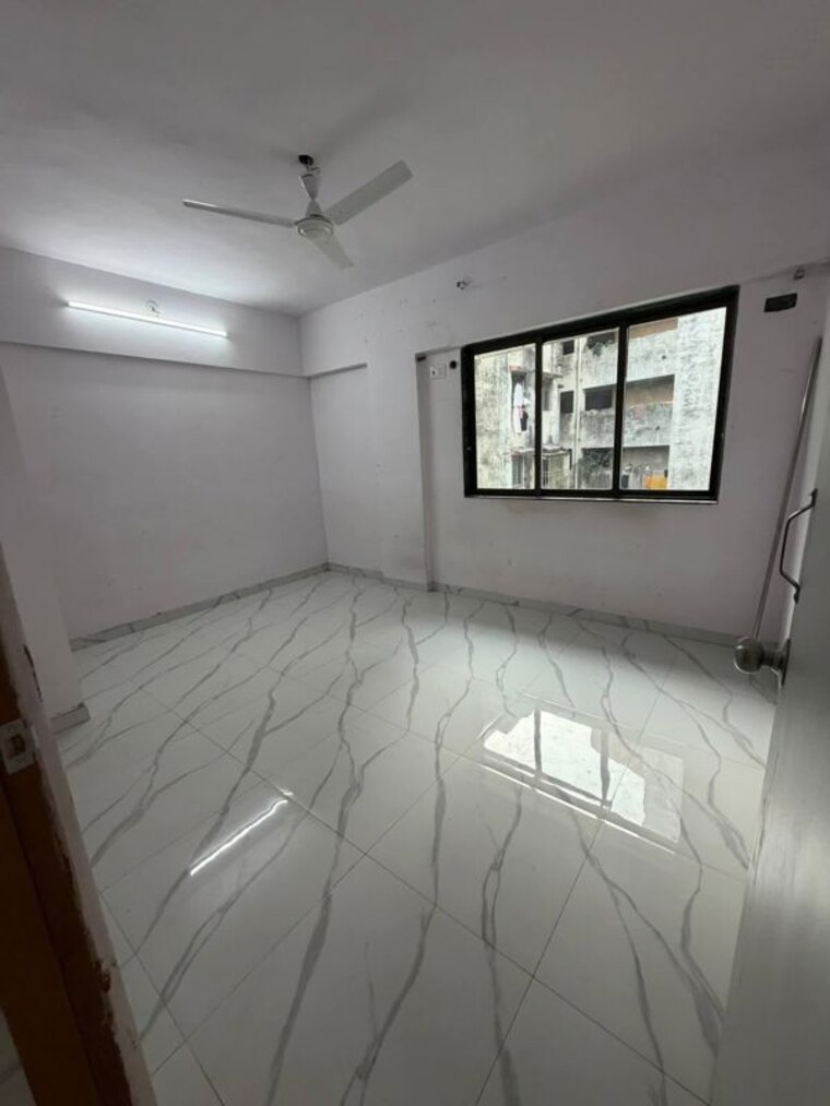 Room, dn nagar 2 Bedroom 800 Sq.Ft. Apartment In Dn Nagar Mumbai 9825752