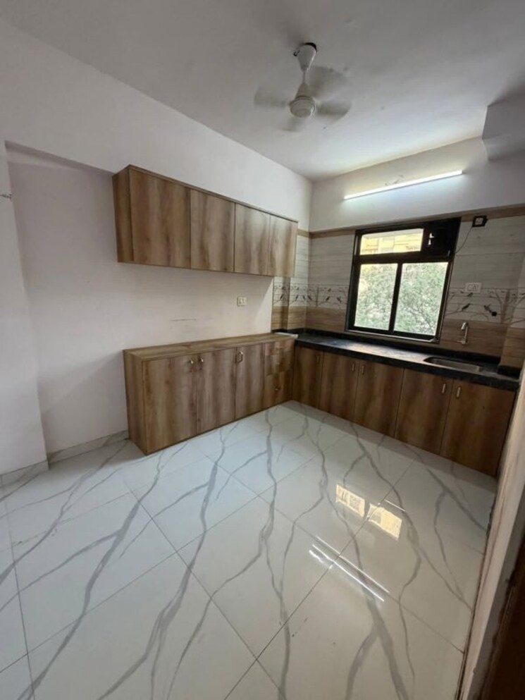 Kitchen, dn nagar 2 Bedroom 800 Sq.Ft. Apartment In Dn Nagar Mumbai 9825752