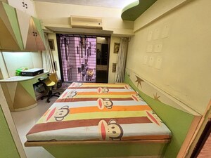 Bedroom in 2 BHK Apartment at Bhoomi Park, Malad West – for Rent