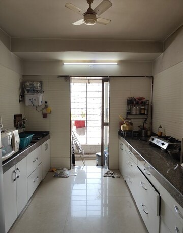 Kitchen in 2 BHK Apartment at Sadguru Poonam Heights, Goregaon West – for Rent