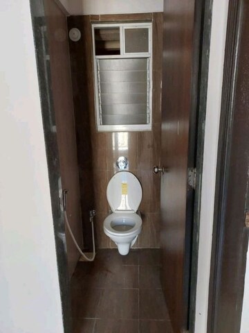 Bathroom in 1 BHK Apartment at KIPL Morya, Kasarvadavali – for Rent